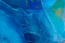 Load image into Gallery viewer, A close up view of the blue and orange, markings and painting of An eye-catching and vivid display of a mystical dragon with gold, blues, pinks and purples dancing on the canvas by Melanie Kilsby, a Vancouver abstract artist. The work has a modern, yet impressionistic feel. It&#39;s magical, seducing, and brilliant in nature.
